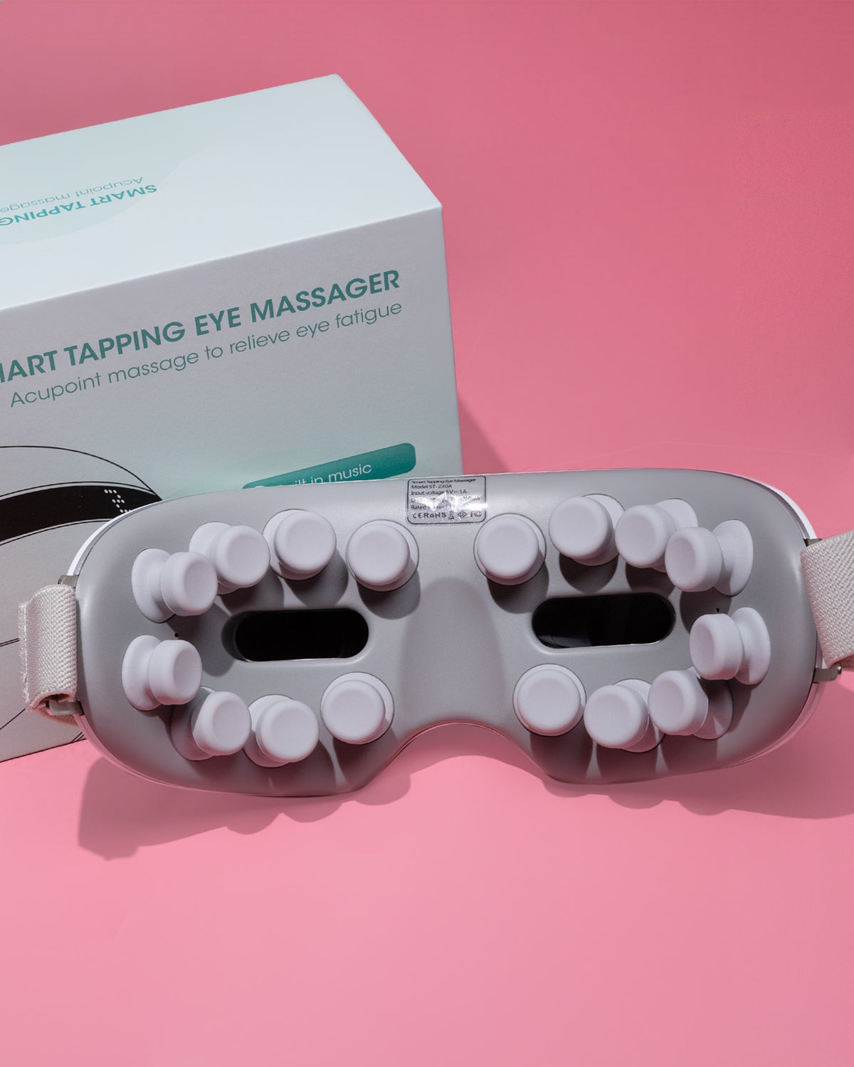 Smart tapping eye massager